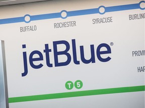 NEW YORK, NY - APRIL 23:  The JetBlue logo is seen at John F. Kennedy Airport on April 23, 2014 in the Queens borough of New York City. JetBlue pilots voted to unionize today by a 71% margin.  (Photo by Andrew Burton/Getty Images)