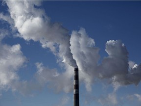 Smoke billows from a coal fired power plant on November 25, 2015 in Shanxi, China.