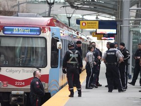 Calgary Police and Transit officers at the scene of a serious assault on a CTrain in downtown Calgary on Friday, November 15, 2019. One male was taken to hospital.