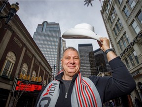 Canadian Football League Commissioner Randy Ambrosie with his official Calgary white hat after Tourism Calgary's Cindy Good swore him in with the official white hat oath at the Lammle's Western Wear shop.