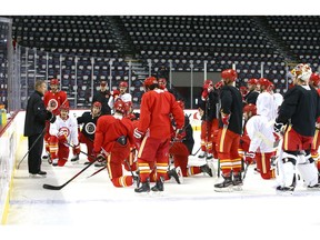 Calgary Flames newly appointed head coach Geoff Ward (L) leads practice in Calgary at the Saddledome on Friday, November 29, 2019. The NHL team officially announced Bill Peters will no longer coach the team and it has accepted Peters' resignation. Jim Wells/Postmedia