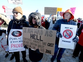 A large number of protesters gather outside the Westin Airport Hotel in northeast Calgary on Saturday. The UCP were holding their AGM over the weekend at the hotel. Photo by Jim Wells/Postmedia.