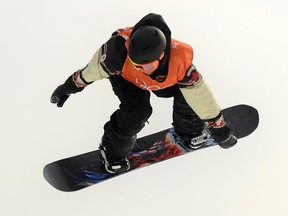 File - Tyler Nicholson of Canada competes during the Men's Slopestyle qualification on day one of the PyeongChang 2018 Winter Olympics. One of the pioneers of the sport of snowboarding, Jake Burton Carpenter, has died.