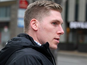 Former Mount Royal hockey captain Matthew Brown leaves the Calgary Courts Centre. Brown is accused of attacking an MRU professor in her Springbank Hill home last year.