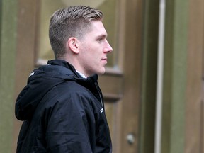 Former Mount Royal hockey captain Matthew Brown leaves the Calgary Courts Centre. Brown is accused of attacking an MRU professor in her Springbank Hill home last year. Tuesday, November 12, 2019. Brendan Miller/Postmedia