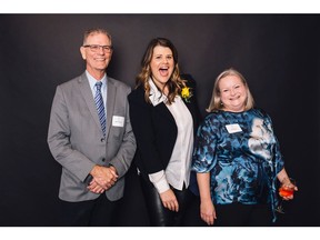 All smiles at the Rozsa Foundation's 16th Annual Rozsa Awards celebration at the Jack Singer is award recipient Sara Leishman, executive director of Calgary Folk Music Festival, (centre). Joining Leishman are Rob Pritchard and Karin King. Photo courtesy: Mike Tan/Diane + Mike Photography