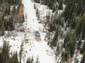 An abandoned car stuck in an ice-filled creek along a forest service road northeast of Cranbrook, B.C., is shown in this recent police handout photo. A search for a couple in southeastern British Columbia has ended with the pair found safe after being stranded for days in a remote area of the Rocky Mountains. RCMP Cpl. Jesse O'Donaghey says the search began after 22-year-old Catherine Gibbons was reported missing Wednesday, five days after she had last spoken to friends or family.