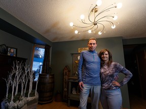 Drew Brabbins, who was awaiting a lung transplant, is shown with his wife Bonnie at their home in Sherwood Park on Nov. 7, 2019.