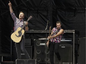 Dierks Bentley (left) performs with his band on the main stage at Big Valley Jamboree 2016 in Camrose, Alberta on Friday, July 29, 2016. The country star will return to Big Valley Jamboree in 2020. Ian Kucerak / Postmedia