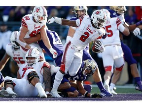 Nov 2, 2019; Seattle, WA, USA; Utah Utes running back Zack Moss (2) scores a touchdown against the Washington Huskies during the fourth quarter at Husky Stadium. Mandatory Credit: Jennifer Buchanan-USA TODAY Sports ORG XMIT: USATSI-404368