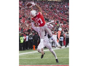 Ohio State Buckeyes wide receiver Chris Olave makes a fourth-quarter touchdown catch over Penn State Nittany Lions cornerback John Reid at Ohio Stadium. Photo by Greg Bartram/USA TODAY Sports.