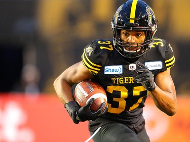 Frankie Williams of the Hamilton Tiger-Cats runs the ball during the 107th Grey Cup CFL championship football game in Calgary on Sunday, November 24, 2019. Al Charest/Postmedia
