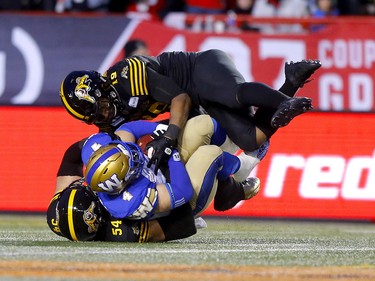 Winnipeg Blue Bombers, Adam Bighill with a fumble recovery against the  Hamilton Tiger-Cats, in first half action at McMahon stadium during the 107th Grey Cup in Calgary on Sunday, November 24, 2019. Darren Makowichuk/Postmedia