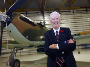 Pilot Gordon Hill is reunited with a Hawker Hurricane plane during the unveiling at the Hangar Flight Museum in Calgary on Wednesday, November 6, 2019. Darren Makowichuk/Postmedia