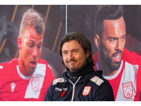 Cavalry FC coach and GM Tommy Wheeldon Jr listens to a question during a press conference at ATCO at Spruce Meadows in Calgary on Friday. Cavalry FC take on Forge FC in the second leg of the CPL championship game on Saturday. Photo by Jim Wells/Postmedia.