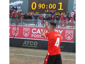 Cavalry FC Dominck Zator salutes the fans following Leg 2 of the Canadian Premier League Championship  between Forge FC and Cavalry FC at ATCO Field at Spruce Meadows in Calgary on Saturday. Forge won 1-0 and were crowned league champions. Photo by Jim Wells/Postmedia.