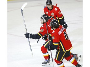 Calgary Flames forward Matthew Tkachuk scores the OT winner against Arizona Coyotes goalie Antti Raanta at the Scotiabank Saddledome in Calgary on Tuesday night. Photo by Darren Makowichuk/Postmedia.