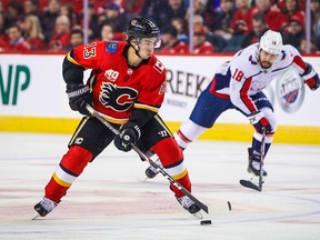 Calgary Flames left wing Johnny Gaudreau carries the puck against the Washington Capitals during the first period at Scotiabank Saddledome on Oct. 22, 2019.