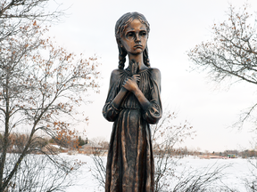 The Holodomor statue Bitter Memories of Childhood in Regina marks the Ukrainian genocide under Josef Stalin.
