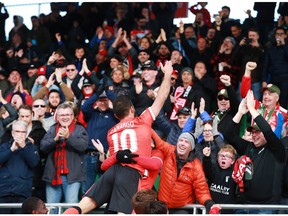 Cavalry FC Sergio Camargo celebrates with fans after a second half goal during CPL soccer action between FC Edmonton and Cavalry FC at ATCO Field at Spruce Meadows in Calgary on Saturday, October 19, 2019. Cavalry won 3-1 and took the fall season. Jim Wells/Postmedia