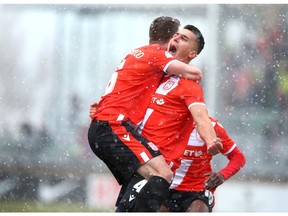 Cavalry FC Dominick Zator celebrates his winning goal with teammate Nik Ledgerwood in 78 minute over York9 FC during Canadian Premier League soccer action at Atco Field in Spruce Meadows in Calgary on  Saturday, May 4, 2019. Cavalry won 2-1 in their inaugural game of the season. Jim Wells/Postmedia