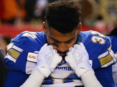 The Winnipeg Blue Bombers Andrew Harris has a quiet moment before the start of the 107th Grey Cup in Calgary Sunday, November 24, 2019. Gavin Young/Postmedia