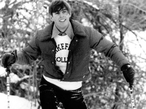 Prince Andrew wearing his Lakefield school T-shirt, tries his skis while practising with the Lakefield College ski team at Cedar Mountain, near Lakefield, Ont. in this Jan. 21 1977 photo.