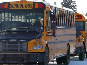 School buses are seen as they arrive at Maple Ridge School in SE Calgary on Wednesday, November 6, 2019. Brendan Miller/Postmedia