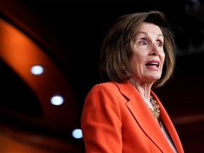 FILE PHOTO: Speaker of the House Nancy Pelosi (D-CA) speaks during a media briefing ahead of a House vote authorizing an impeachment inquiry into U.S. President Trump on Capitol Hill in Washington, U.S., October 31, 2019. REUTERS/Joshua Roberts/File Photo ORG XMIT: FW1