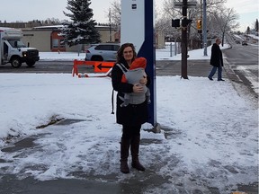 Jennifer Burgess and her son before their first ride on the Yellow MAX bus in Calgary. Submitted photo.