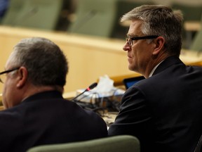 Chief electoral officer Glen Resler, right, answered questions from members during a meeting of the standing committee on legislative offices at the Federal Building on Friday, Nov. 29, 2019.