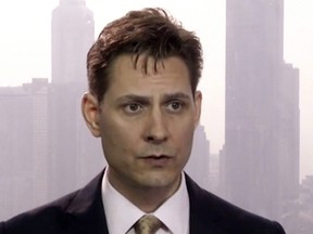In this file image made from a video taken on March 28, 2018, Michael Kovrig, an adviser with the International Crisis Group, a Brussels-based non-governmental organization, speaks during an interview in Hong Kong. Global Affairs Canada says consular officials in China have met for the 10th time with a Canadian detained in China.