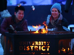 Marshmallow roasting and warming by the fire is one of many activities on the menu at Northwestival on Sunday, Dec. 8, at University District.