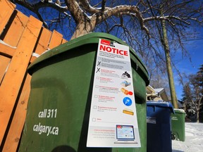 A green cart notice showing what cannot go into Calgary's composting bins was photographed on Wednesday February 13, 2019.  Gavin Young/Postmedia