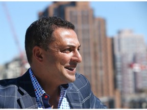 Riaz Mamdani, CEO, Strategic Group speaks at a media event in Calgary on July 26, 2019.