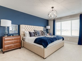 The master bedroom in the Beaumont 4 show home by Sterling Homes in Ranchers' Rise, Okotoks.