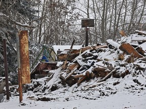 A swing and basketball net in the yard of this home that was destroyed as an investigation is underway after five people, three of them children, were found dead on Friday following a fire in the hamlet of Rochford Bridge, after fire services responded to the fire around 4 p.m. on Thursday, 130 km west of Edmonton, December 7, 2019. Ed Kaiser/Postmedia
