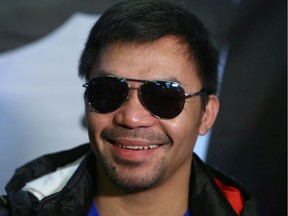 Manny Pacquiao speaks to media in Calgary on Friday, December 27, 2019. Jim Wells/Postmedia