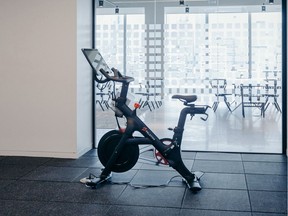 A Peloton Cycle Inc. bicycle stands in the gym area of the Dwight Capital LLC new office space inside 787 11th Avenue in New York, U.S., on Monday, July 30, 2018. The glitzy new offices at 787 11th Avenue in Hell's Kitchen for financial companies are a departure from the building's 1920s roots as a service hub for Packard Motor Car Co. Photographer: Johannes Berg/Bloomberg