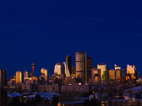 Sunrise lights up the towers of the downtown Calgary skyline on Monday, December 16, 2019.