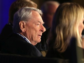 Dick Pound, an IOC member, listens during The Future of Sports panel at Global Business Forum at the Banff Springs Hotel in 2016