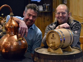 David Feil/Cochrane Times. John Hromyk (left) and Brett Schönekess presented their vision for Bragg Creek Distillers to their friends in the community on Feb. 21, 2018.