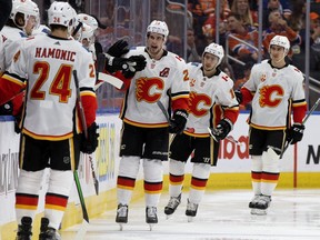 Flames' Sean Monahan  celebrates his goal against the Edmonton Oilers in the second period at Rogers Place in Edmonton on Friday, Dec. 27, 2019.