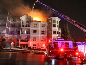 Emergency crews respond to a condo fire at 14th Street and 23rd Avenue S.W. on Friday, Dec. 20, 2019.