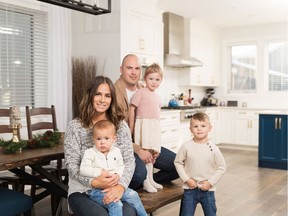 Josh and Kara Hamill with their children.