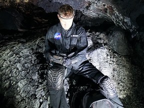 University of Calgary professor Kent Hecker tests the MUSE headband inside a lava tube at Mauna Loa, Hawaii.