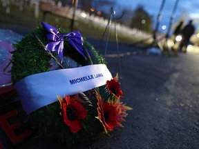 A wreath honouring Calgary Herald journalist Michelle Lang rests at the Field of Crosses on Memorial Drive on Nov. 5, 2018. Lang died with four soldiers in a roadside bomb explosion in Afghanistan on Dec. 30, 2009.