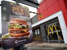 A sign promoting McDonald's "PLT" burger with a Beyond Meat plant-based patty in a London, Ont., test location.