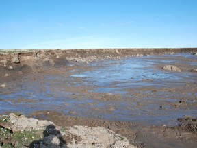 A large expanse of permafrost on Banks Island in the Western Canadian Arctic melting in the summer heat, a process that scientists warn could reshape much of the northern landscape and release huge amounts of carbon into the atmosphere.