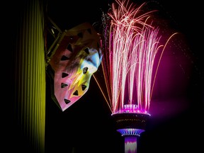 Calgary brings in 2019 with fireworks shooting from the top of the Calgary Tower. The photo was taken from the third level of the parkade next to the Scotiabank Saddledome on Tuesday, January 1, 2019.